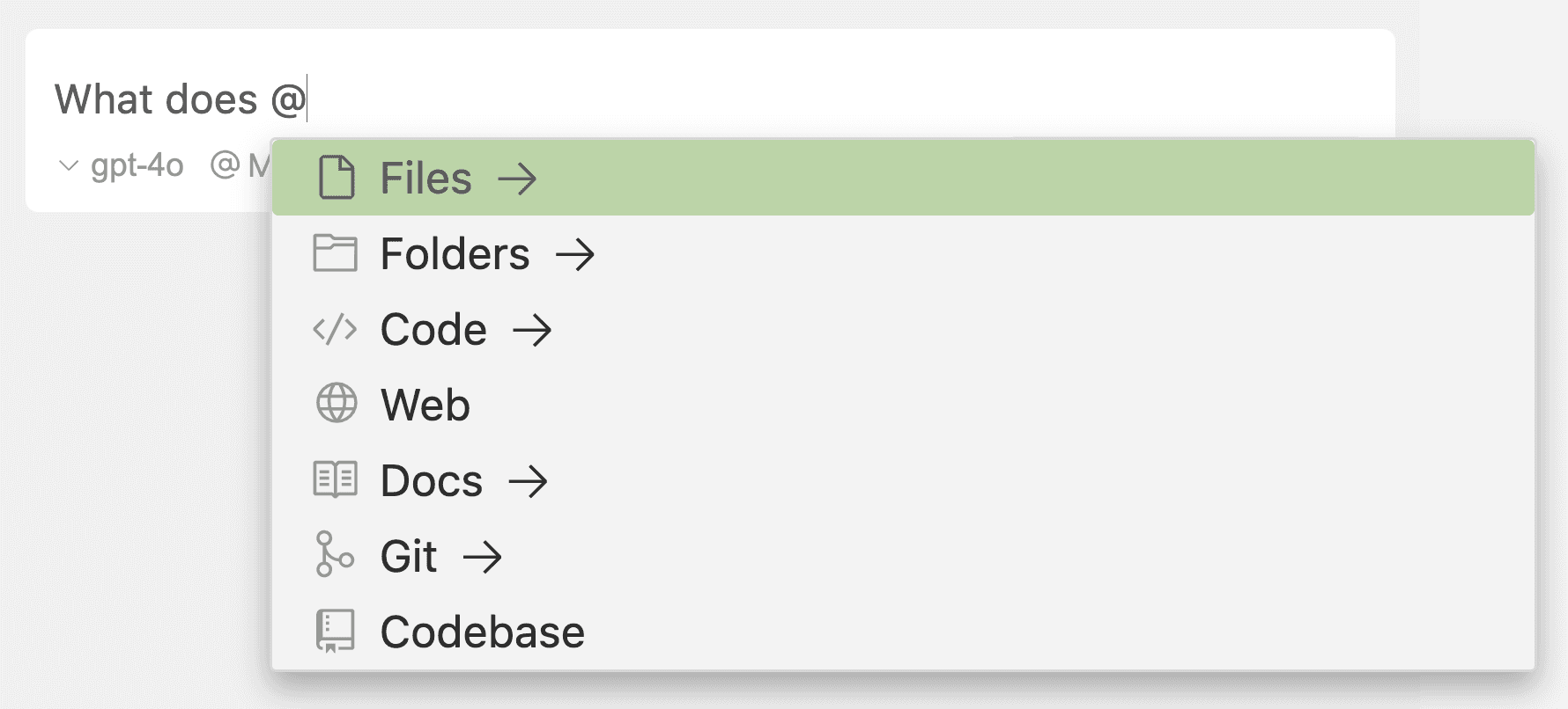 Cursor's @ mention menu open mid-prompt, listing Files, Folders, Code, Web, Docs, Git and Codebase as context sources with Files highlighted